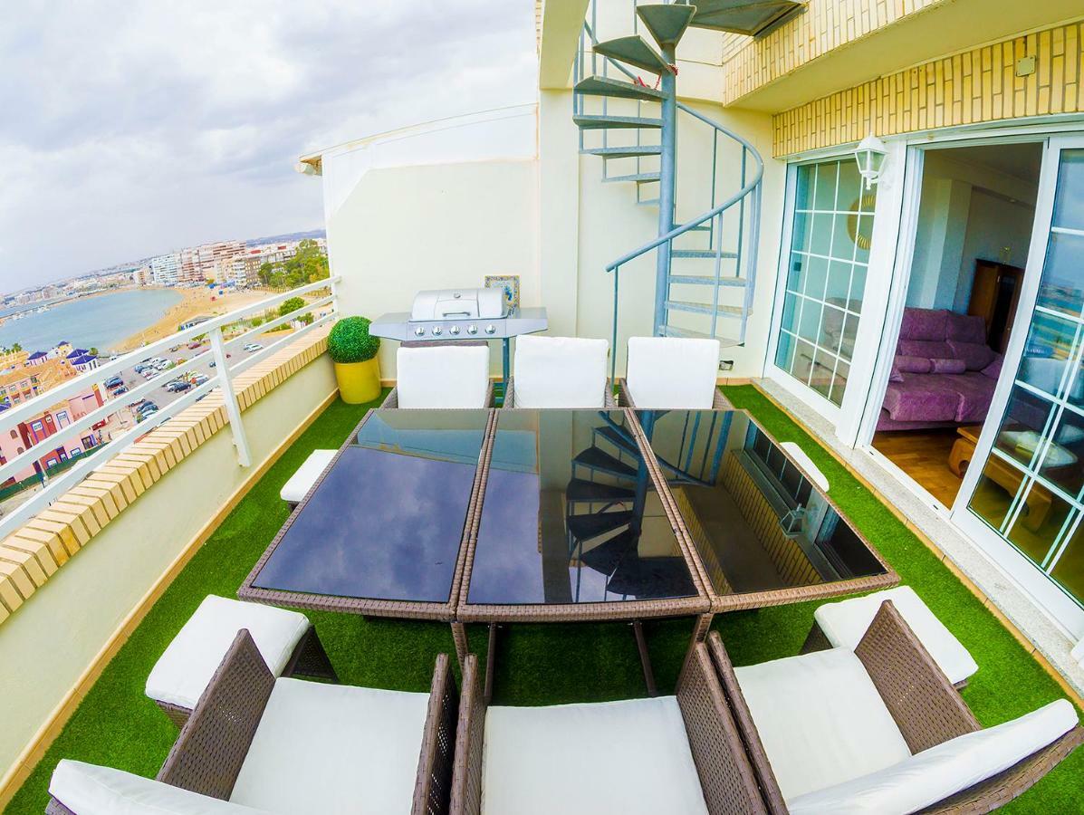 Torrevieja Experience Atico 1ª Linea Apartment Luaran gambar